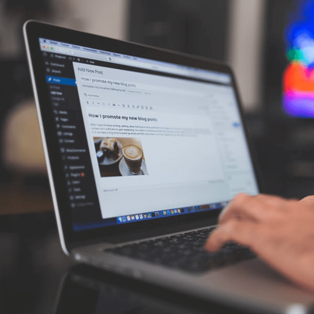 Typing into a laptop computer.