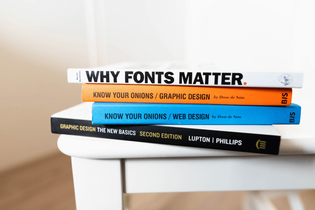 Piles of books on visual identity