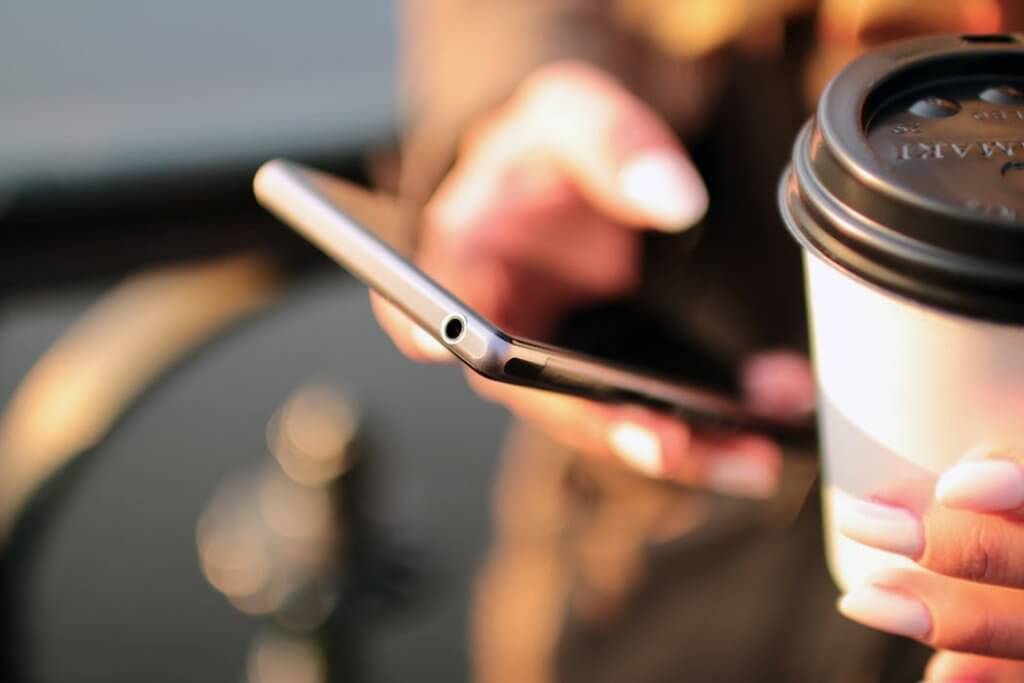 Hands, coffee, smarphone